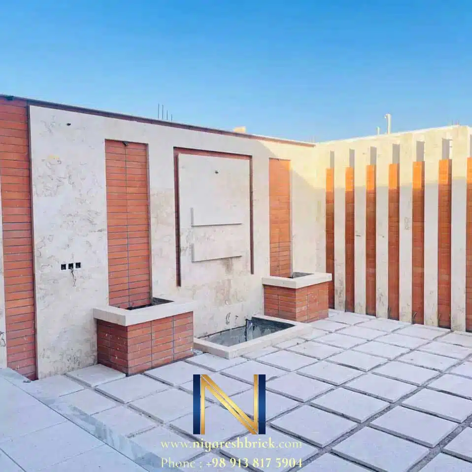 دیوار حیاط با آجر نما و سنگ